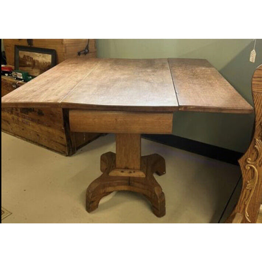 Primitive Center Pedestal Drop Leaf Table